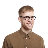 waist-up-portrait-happy-ecstatic-young-man-with-stubble-wearing-trendy-glasses-formal-shirt-grinning-broadly-feeling-overjoyed-after-he-got-promotion-work-bonus-excellent-job